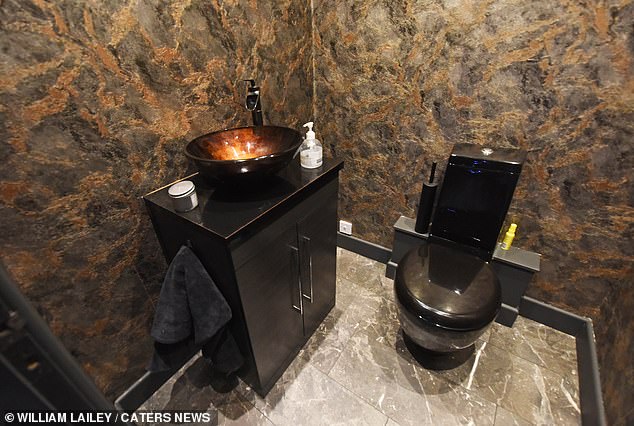 The bar even comes kitted with a bathroom, making it totally unnecessary to leave - even when nature calls